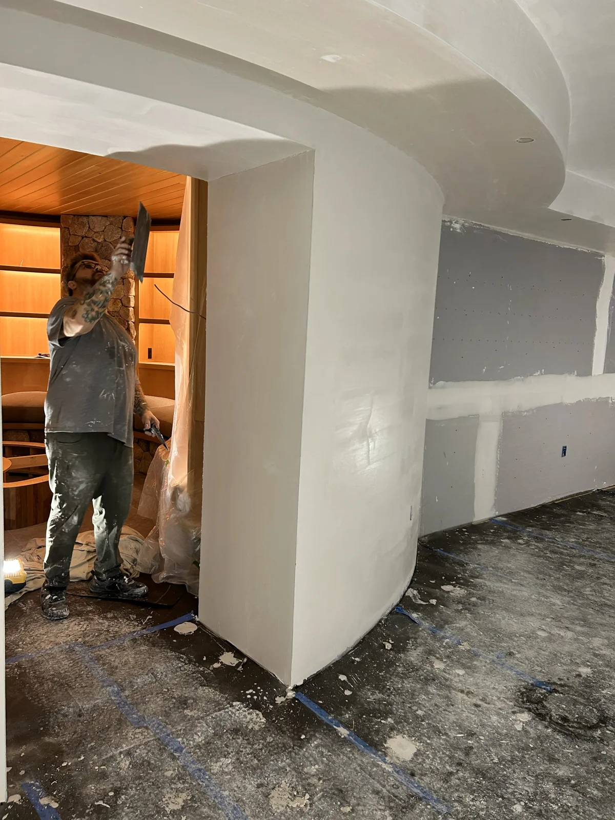 plastering the entryway to the of the curved wall